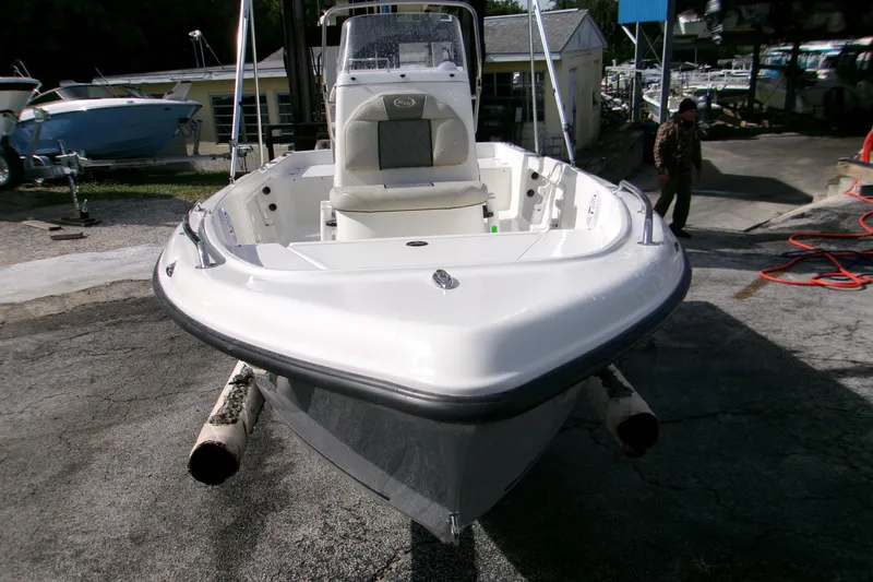 Slide: The Image of 2026 Key West 1720 Center Console boat in a marina setting. - 14