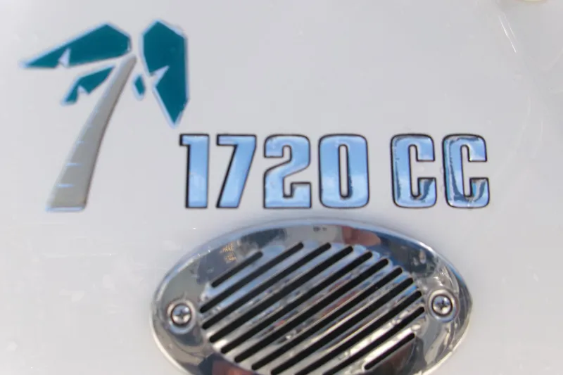 Slide: The Image of Key West 1720 Center Console 2026 logo with chrome vent detail. - 17
