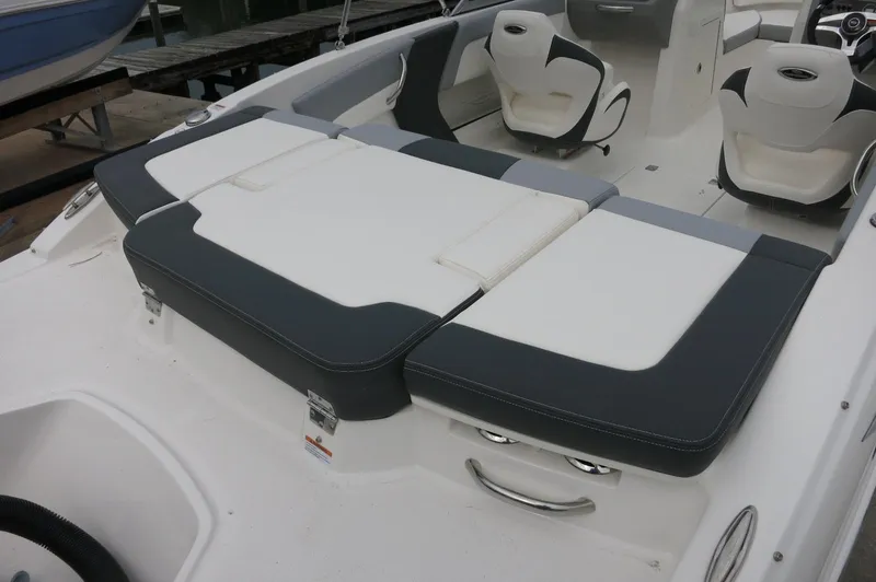Slide: The Image of 2024 Chaparral 19 SSi boat interior with white and gray seating. - 13
