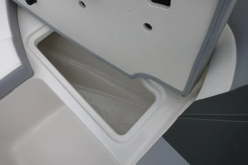 Slide: The Image of 2024 Chaparral 19 SSi boat storage compartment. - 19
