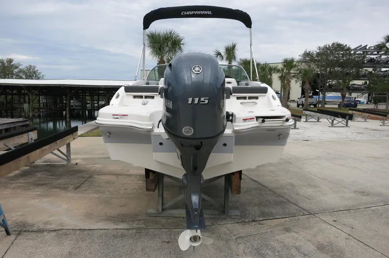 Slide: The Image of 2024 Chaparral 19 SSi boat with Yamaha 115 outboard motor, rear view. - 6