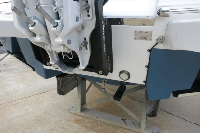 Slide: The Image of 2024 Crevalle 26 HCO boat transom and engine mount on a stand. - 12