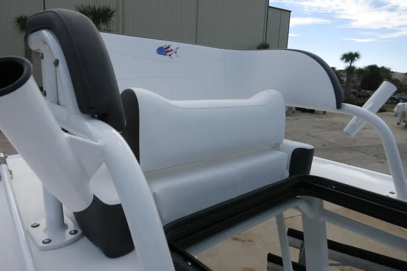 Slide: The Image of 2024 Crevalle 26 HCO boat seating and rod holders. - 27