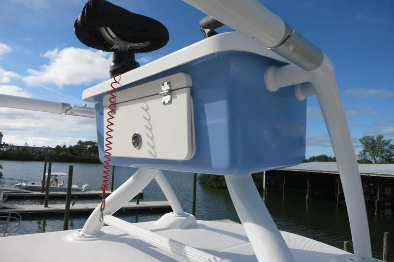 Slide: The Image of 2024 Robalo R266 Skydeck boat with elevated helm station. - 21