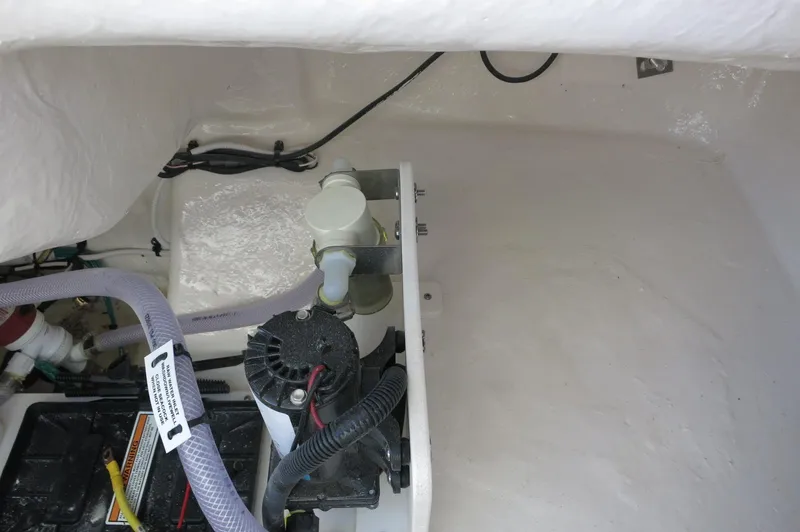 Slide: The Image of 2024 Robalo 222 Explorer CC boat interior wiring and components. - 39