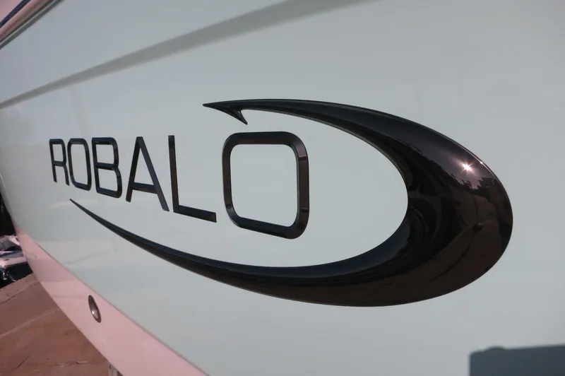 Slide: The Image of 2024 Robalo 222 Explorer CC logo on boat exterior - 4