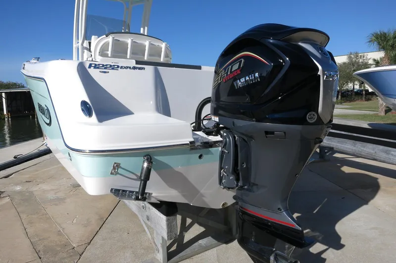 Slide: The Image of 2024 Robalo 222 Explorer CC boat with Yamaha outboard motor. - 6