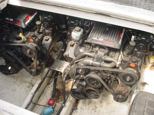 Slide: The Image of Twin MerCruiser engines in a 1998 Maxum 3000SCR boat engine compartment. - 19