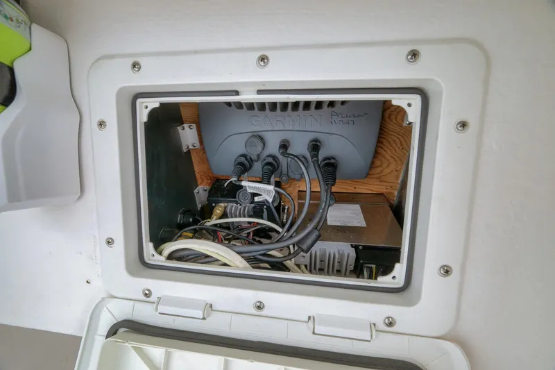 Slide: The Image of Electrical panel inside 2012 Contender 32 Tournament boat with Garmin equipment and wiring. - 47