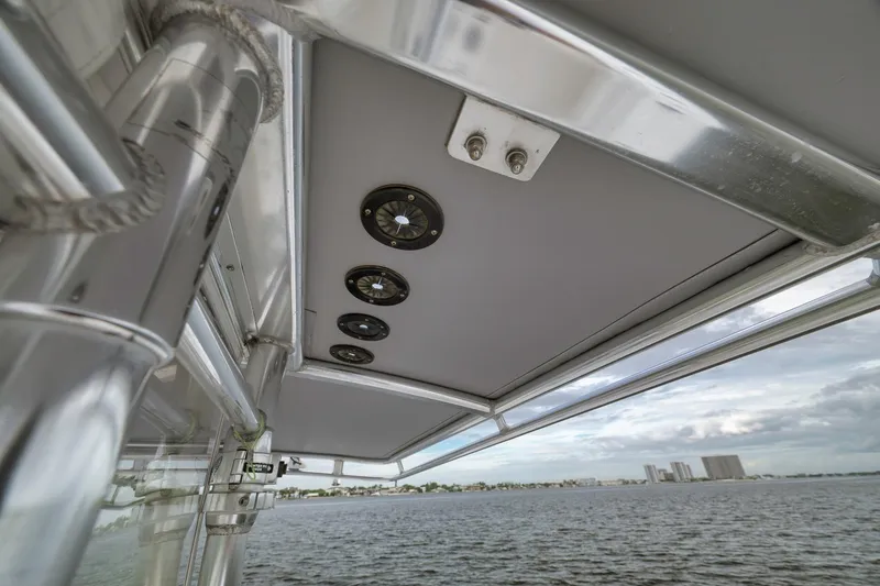 Slide: The Image of 2012 Contender 32 Tournament boat with overhead lights and ocean view. - 51