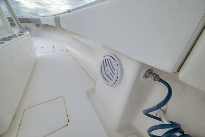 Slide: The Image of 2012 Contender 32 Tournament boat deck with speaker and hose connection. - 57