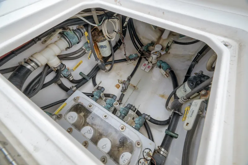 Slide: The Image of 2012 Contender 32 Tournament boat plumbing and wiring system. - 73