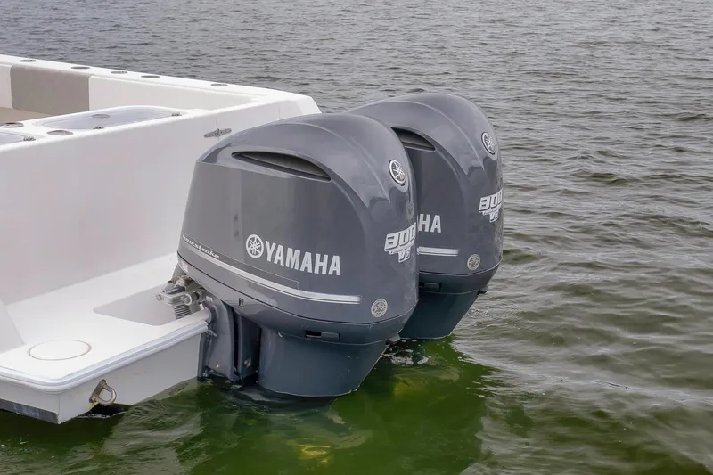 Slide: The Image of 2012 Contender 32 Tournament with twin Yamaha 300 outboard engines on water. - 9