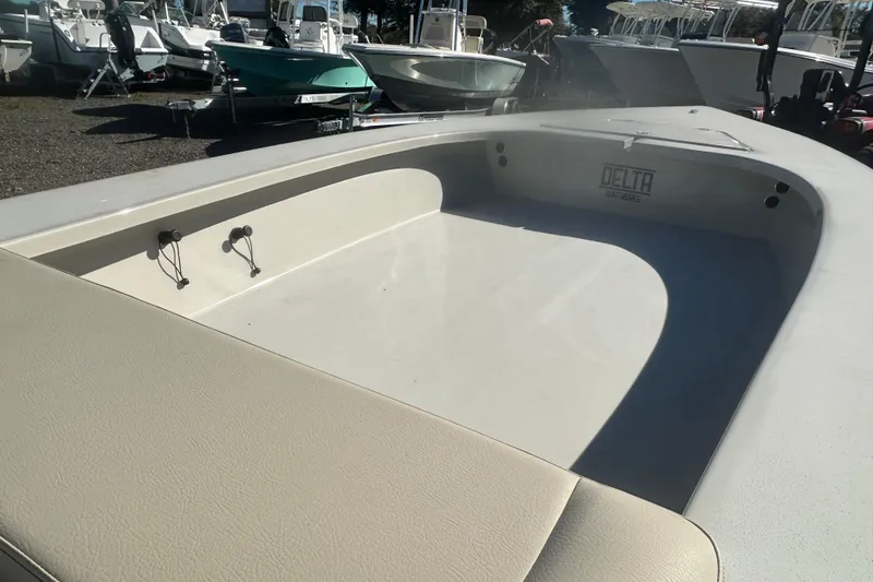 Slide: The Image of 2026 Delta Boatworks Delta D18 interior view at a boatyard. - 10