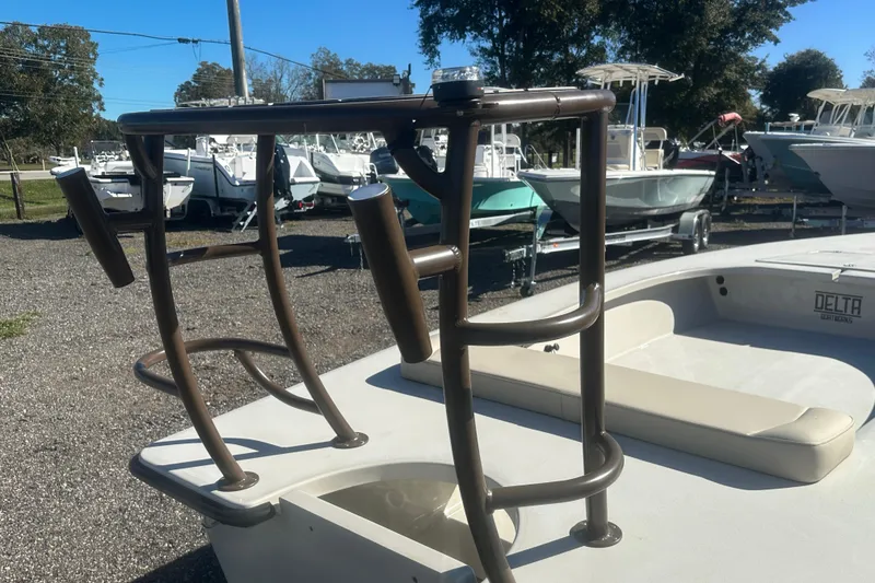 Slide: The Image of Close-up of Delta D18 boat's metal fitting on a textured surface, 2026 model. - 12