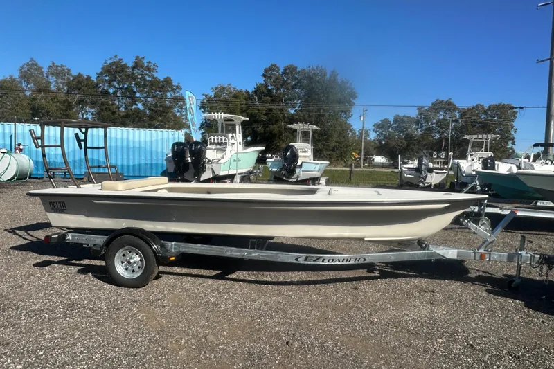 Slide: The Image of 2026 Delta Boatworks Delta D18 with Yamaha 50HP outboard motor, rear view. - 2