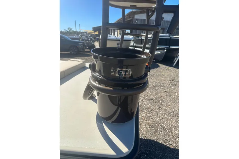 Slide: The Image of Delta D18 boat with YETI cooler on deck, sunny day, outdoor setting. - 23