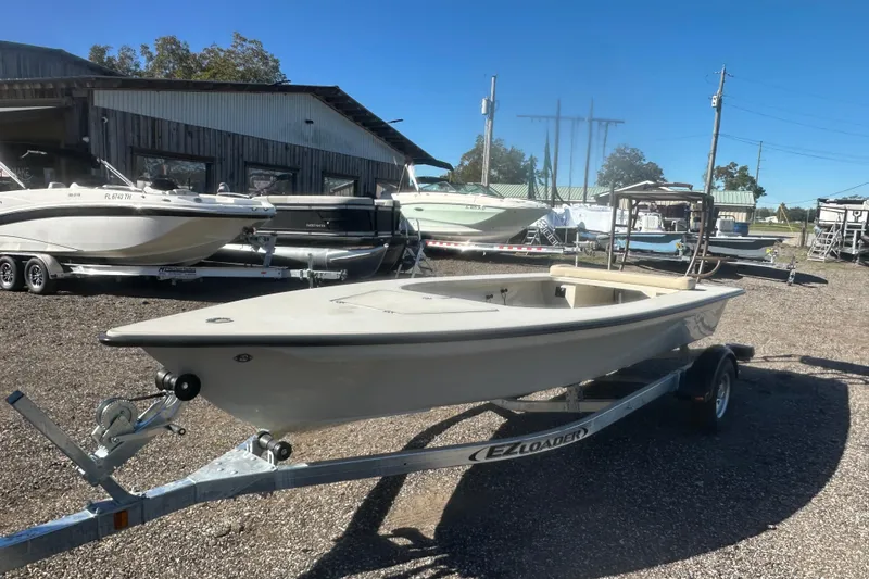 Slide: The Image of 2026 Delta Boatworks Delta D18 with 50 HP outboard motor, rear view. - 7