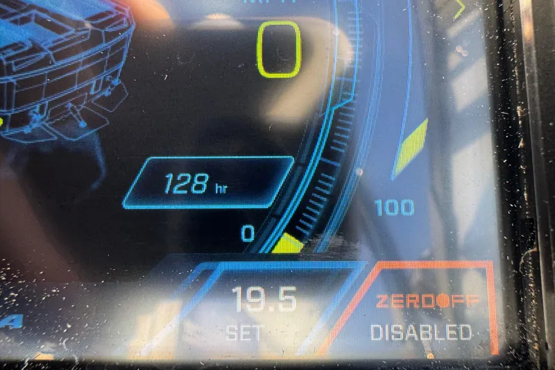 Slide: The Image of Dashboard of 2024 Moomba Tykon showing 128 hours and settings. - 11