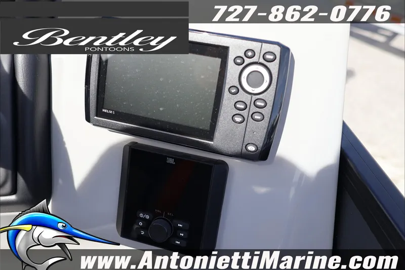 Slide: The Image of Bentley Pontoons Legacy 203 Swingback 2026 dashboard with Helix 5 and JBL controls. - 14