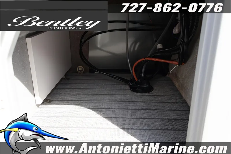 Slide: The Image of Interior view of 2026 Bentley Pontoons Legacy 203 Swingback, featuring storage and wiring. - 23
