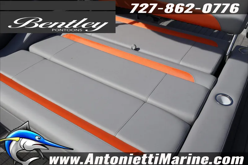 Slide: The Image of 2026 Bentley Pontoons Legacy 203 Swingback with gray and orange seating, Antonietti Marine branding. - 8