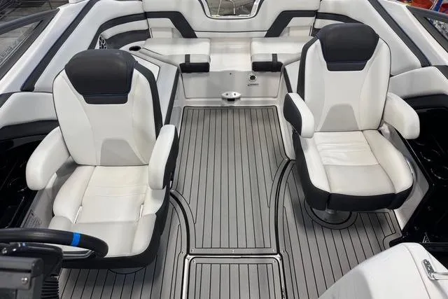 Slide: The Image of 2020 Yamaha Boats 242SE interior with sleek seating and modern design. - 10