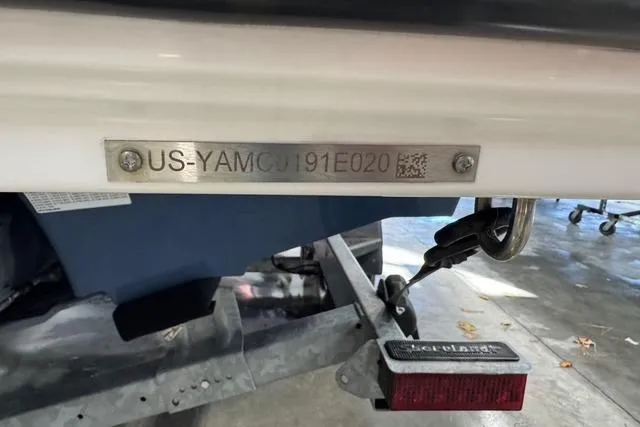 Slide: The Image of 2020 Yamaha Boats 242SE hull identification number on a trailer. - 17