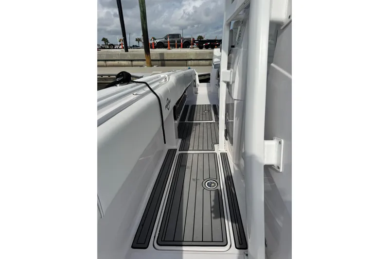 Slide: The Image of 2018 Fountain 34 Center Console boat deck with sleek design and modern features. - 20