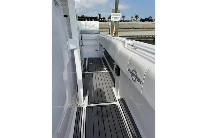 Slide: The Image of 2018 Fountain 34 Center Console boat with sleek deck design and modern features. - 21