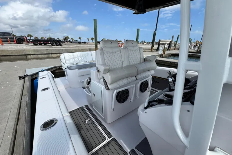 Slide: The Image of 2018 Fountain 34 Center Console boat interior with luxurious seating and modern design. - 4