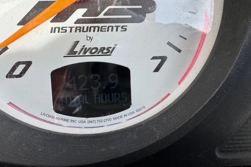Slide: The Image of Instrument gauge showing 423.9 total hours on MB B52 23 Classic, 2020 model. - 11