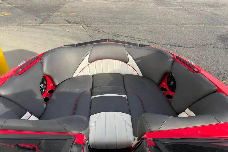 Slide: The Image of 2020 MB B52 23 Classic boat interior with red and gray seating. - 5