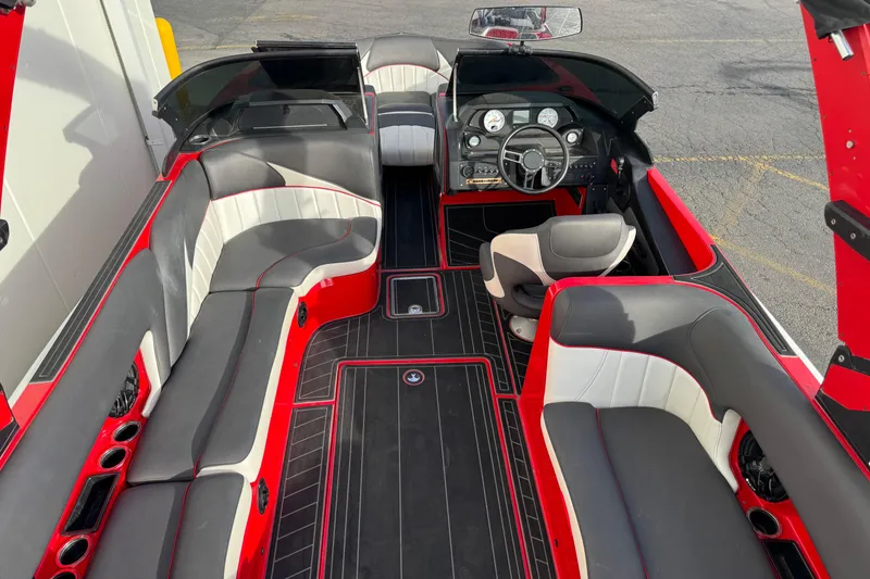 Slide: The Image of Interior of 2020 MB B52 23 Classic boat with red and gray seating. - 6