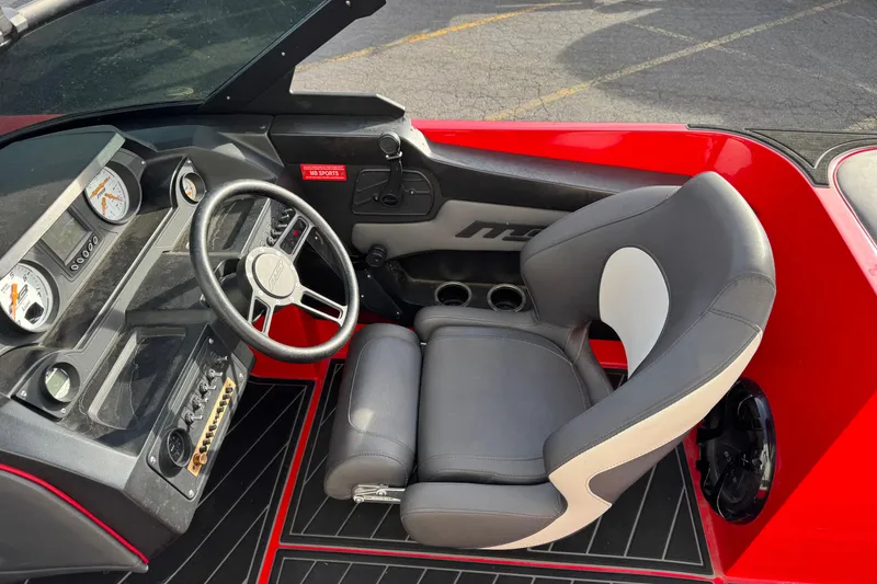 Slide: The Image of 2020 MB B52 23 Classic boat interior with steering wheel and dashboard. - 8