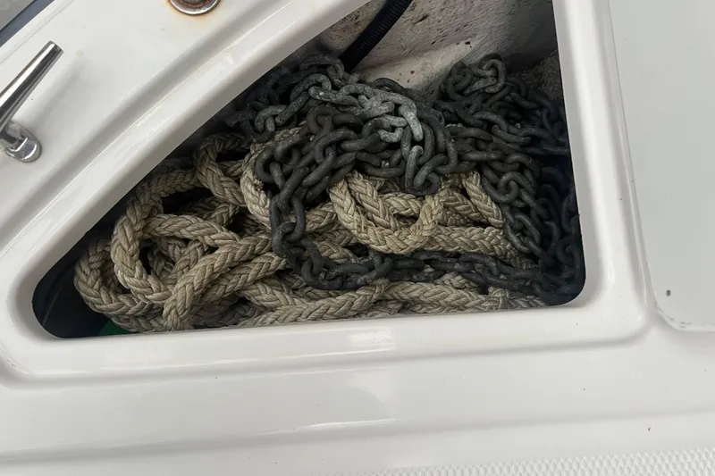Slide: The Image of Rope and chain storage on 2020 Ranger Tugs R-27 Luxury Edition Tug. - 23