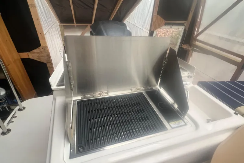 Slide: The Image of Outdoor grill on 2020 Ranger Tugs R-27 Luxury Edition Tug boat. - 24