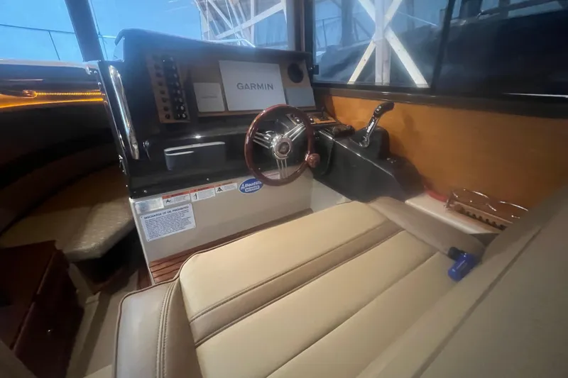 Slide: The Image of 2020 Ranger Tugs R-27 Luxury Edition Tug interior with Garmin navigation system. - 3