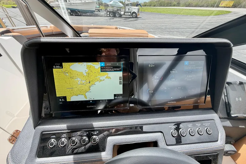 Slide: The Image of Dashboard of 2026 Cobalt R8 Outboard with dual Garmin displays and navigation controls. - 19