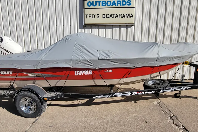Slide: The Image of 2007 Triton DV 176 Mag boat with cover on trailer at Ted's Boatarama. - 1