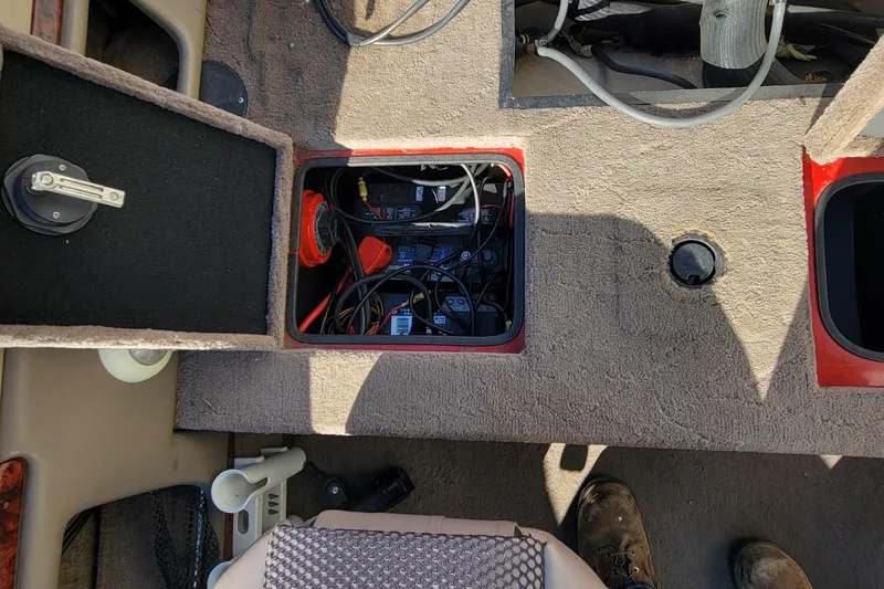Slide: The Image of 2007 Triton DV 176 Mag boat interior showing battery compartment and wiring. - 14