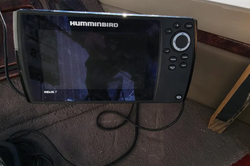 Slide: The Image of Humminbird Helix 7 fish finder on a 2007 Triton DV 176 Mag boat. - 17