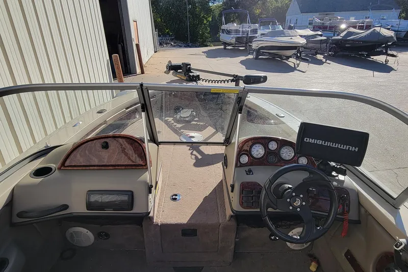 Slide: The Image of 2007 Triton DV 176 Mag boat interior with steering wheel and control panel. - 18