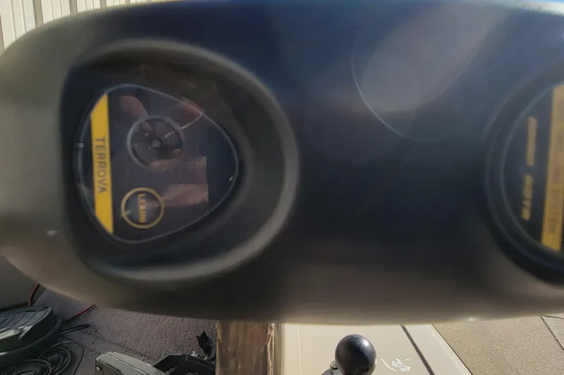 Slide: The Image of Close-up of a 2007 Triton DV 176 Mag boat control panel with Terrova label. - 9