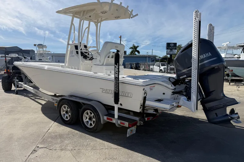 Slide: The Image of 2021 Pathfinder 2500 Hybrid boat on trailer with Yamaha outboard motor. - 22