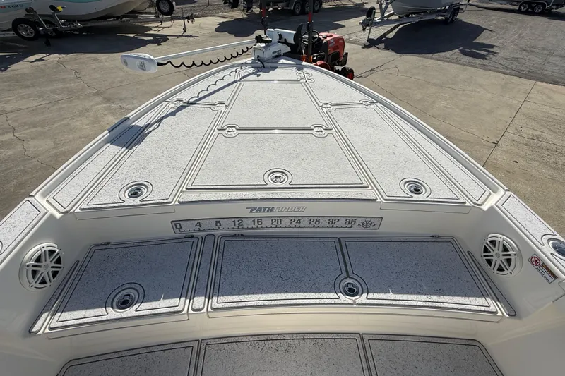 Slide: The Image of Bow view of a 2021 Pathfinder 2500 Hybrid boat, featuring a spacious deck layout. - 7
