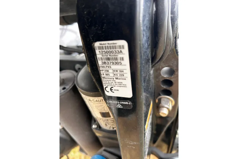 Slide: The Image of Close-up of a 2023 Ranger Z520R engine label with specifications and serial number. - 16