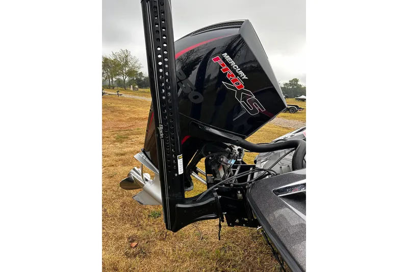 Slide: The Image of 2023 Ranger Z520R boat with Mercury Pro XS engine on grassy field. - 21