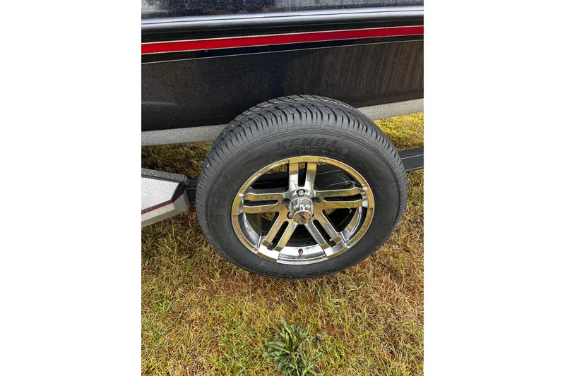 Slide: The Image of 2023 Ranger Z520R Ranger Cup Equipped trailer wheel on grass. - 25