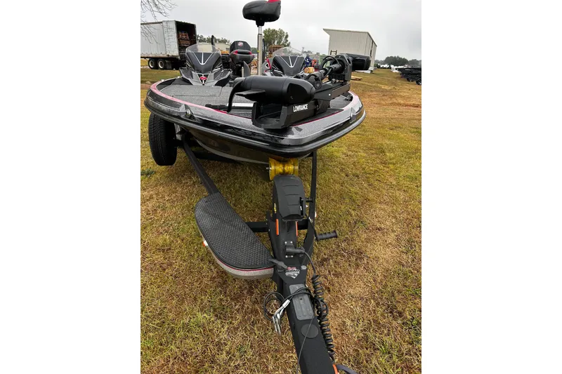 Slide: The Image of 2023 Ranger Z520R Ranger Cup Equipped boat on grassy area, front view. - 26